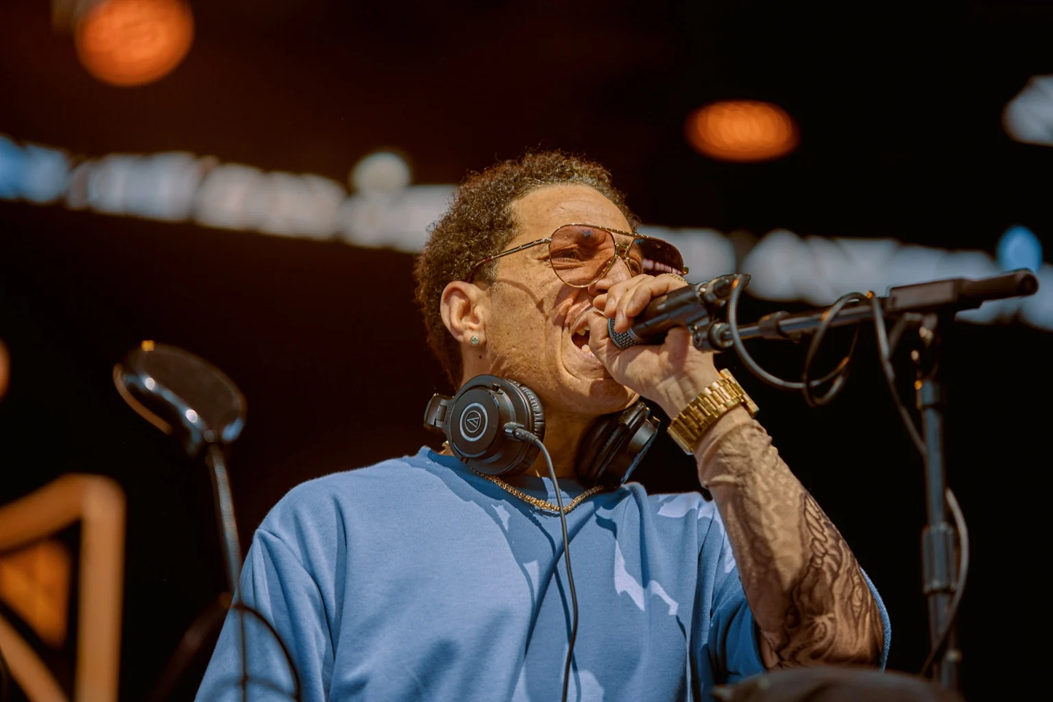 Performer singing on stage