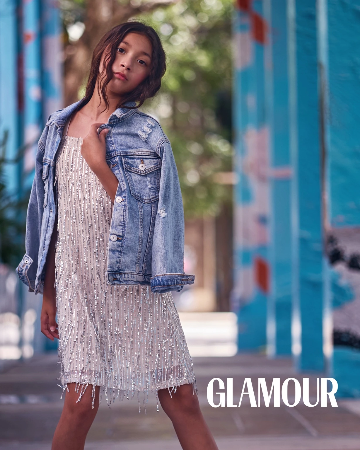 Editorial portrait with a GLAMOUR cover title